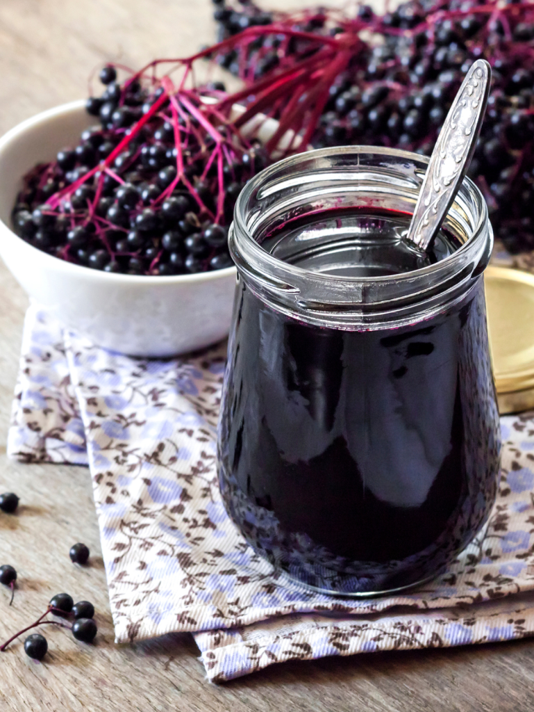 elderberry syrup in a glass jar