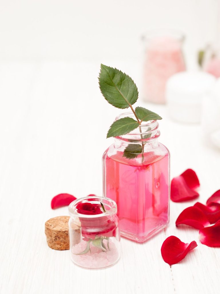 rose water for hair in a glass jar