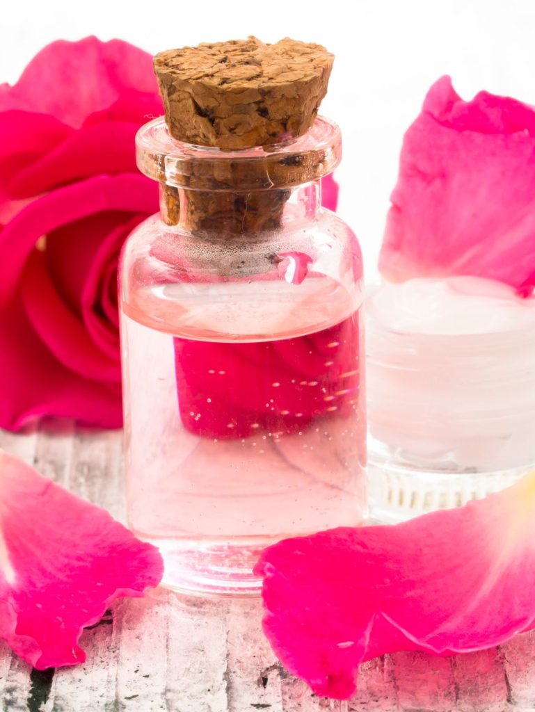 rose water in a glass bottle