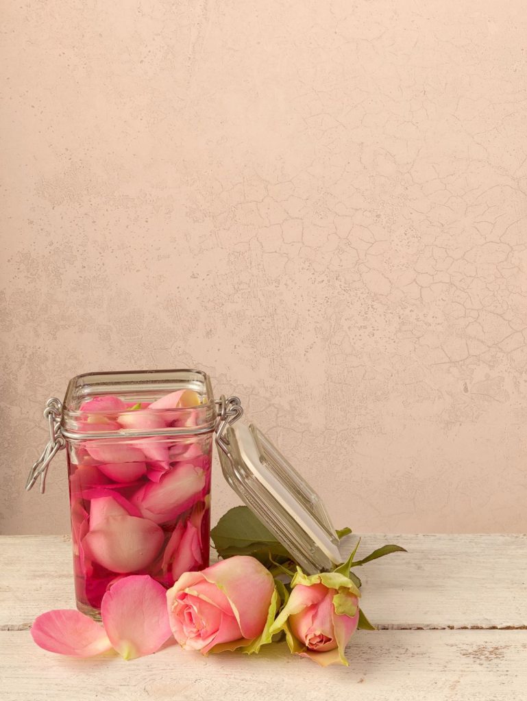 rose petals in a glass jar